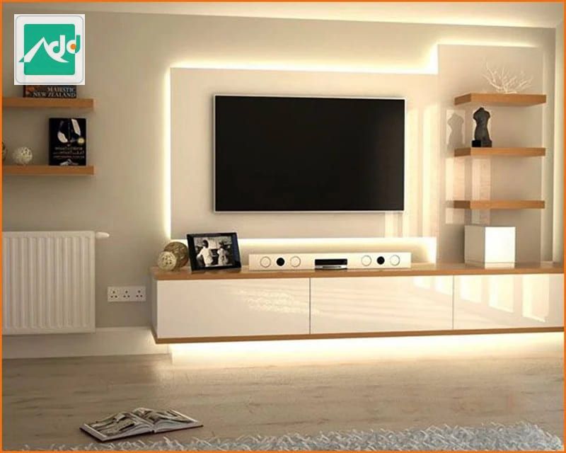 Thiết kế tủ tivi phòng khách này có mọi thứ bạn cần với thiết kế bằng gỗ công nghiệp kiểu dáng đẹp và hệ thống đèn LED.